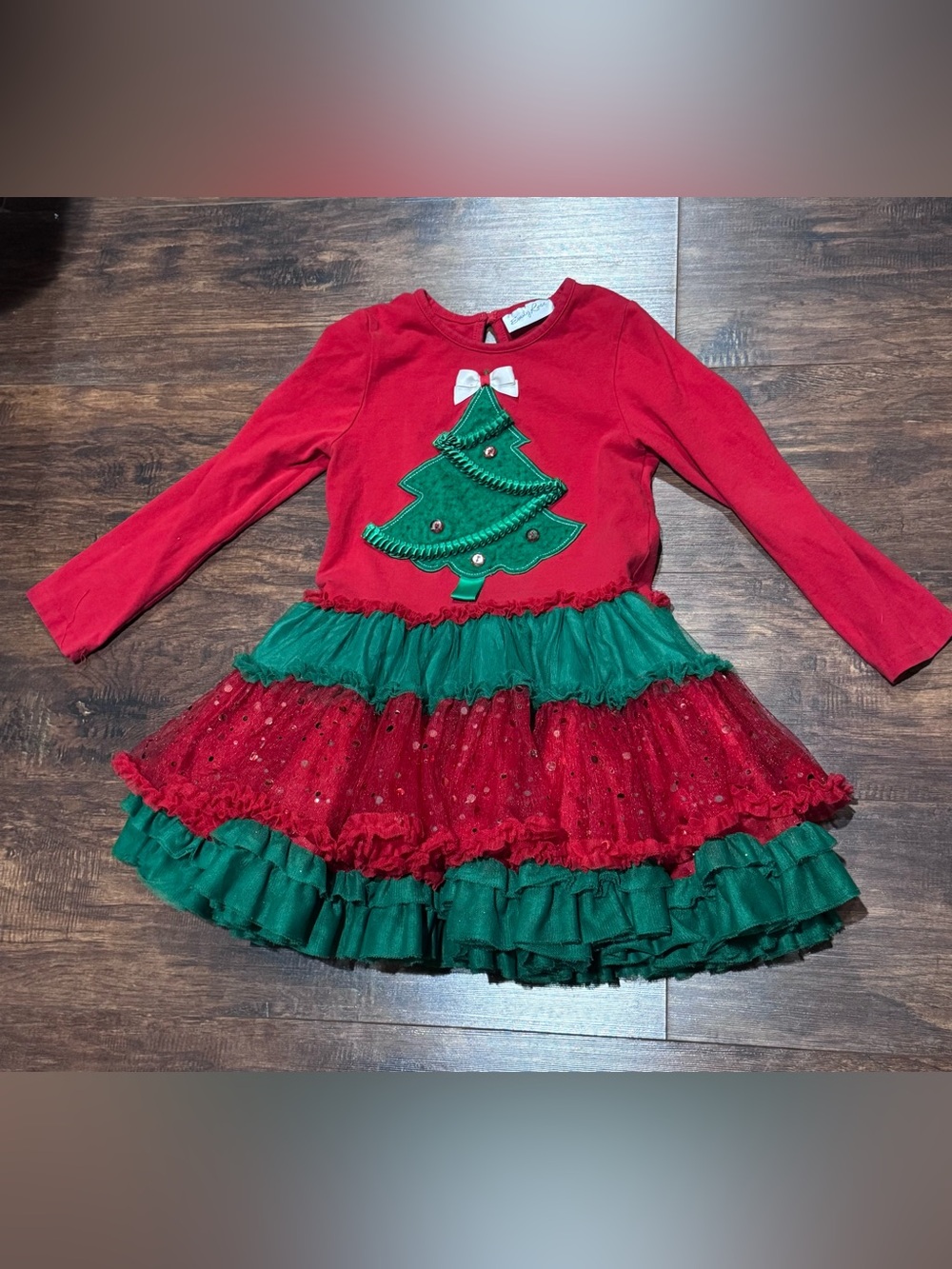 Emily Rose Christmas Dress featuring a festive layered red and green tutu skirt